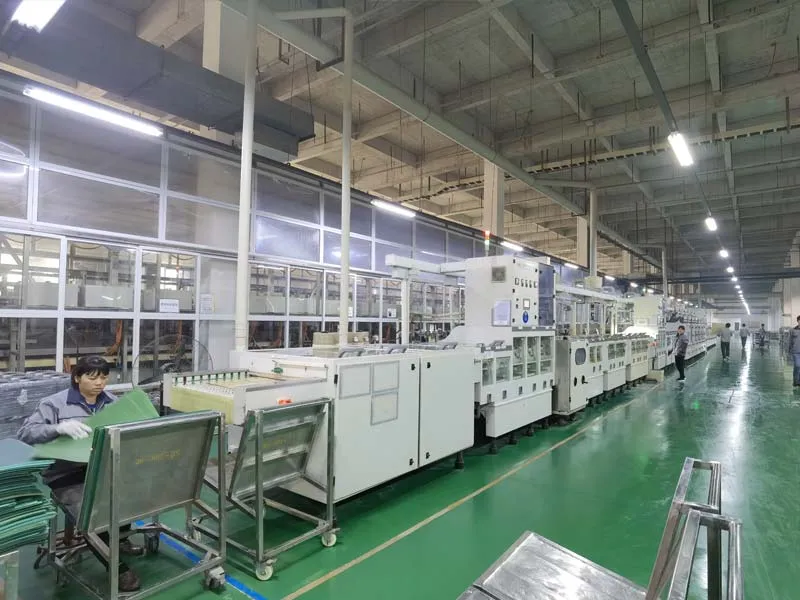 PCB production line with operators at the Hitech Circuits plant